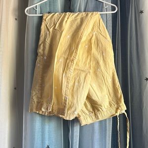 Cute thin yellow star straight leg pants! WOMENS SIZE M